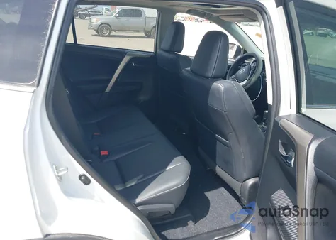 2014 Toyota Rav4 Limited z USA, uszkodzony, nr VIN 2T3DFREV1EW186952